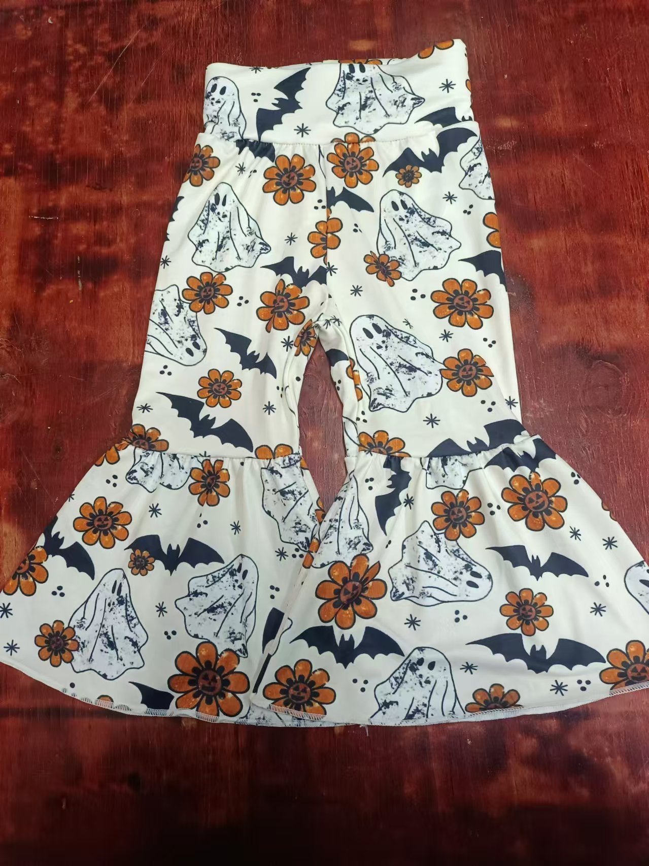 Custom moq 3 eta 6-7weeks Beige high-waisted flared trousers with bat-ghost-flower pattern