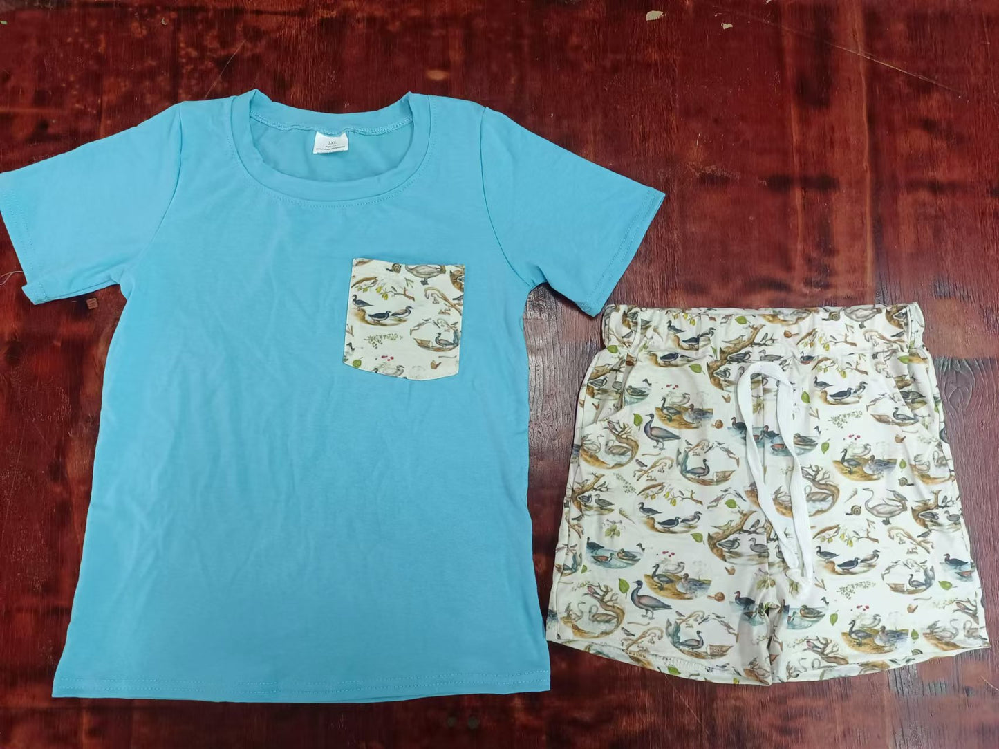 Custom moq 3 eta 6-7weeks Sky Blue Solid Pocket Short Sleeve Top & Duck Beige Shorts Set