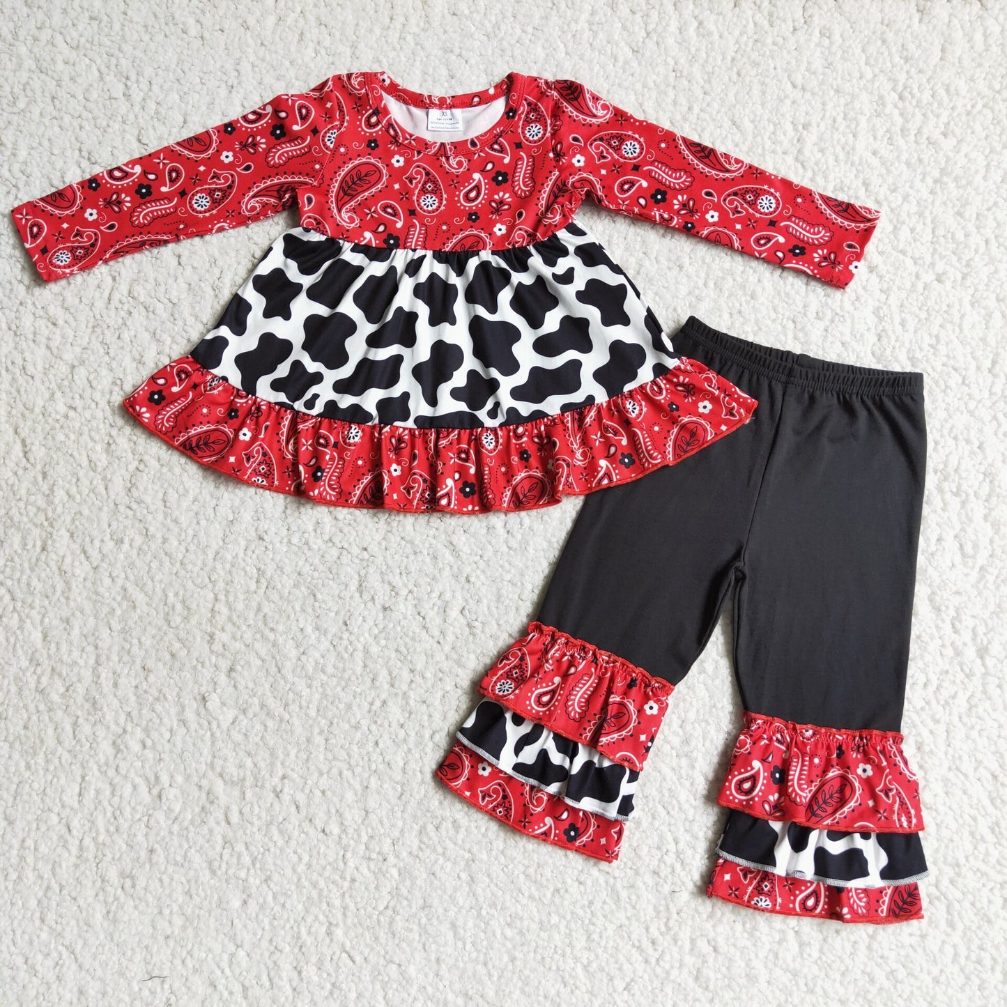 6 B2-23 Red top and black ruffled trousers