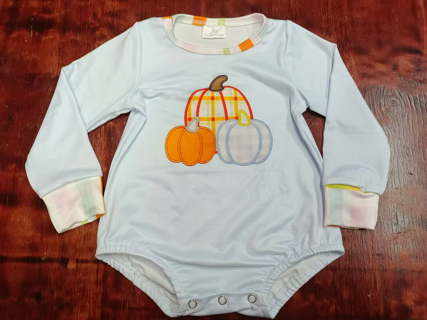 Custom moq 3 eta 6-7weeks Light blue long-sleeved shorts jumpsuit with pumpkin embroidery