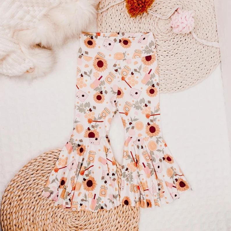 Sunflower flower camera white trousers