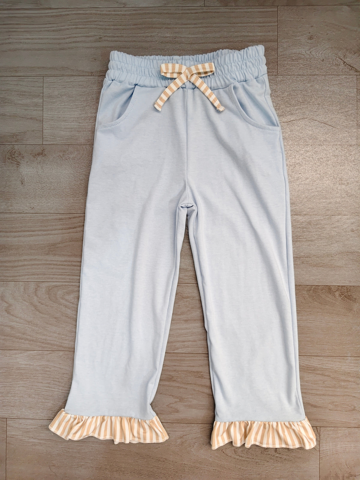 (Sample) No moq cotton P1152 Baby Girls Light Blue Pants With Cute Bows Pockets Ruffle Casual Bottom