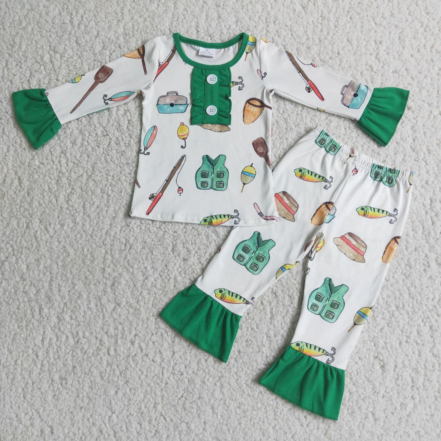green girl pajamas fishing tools