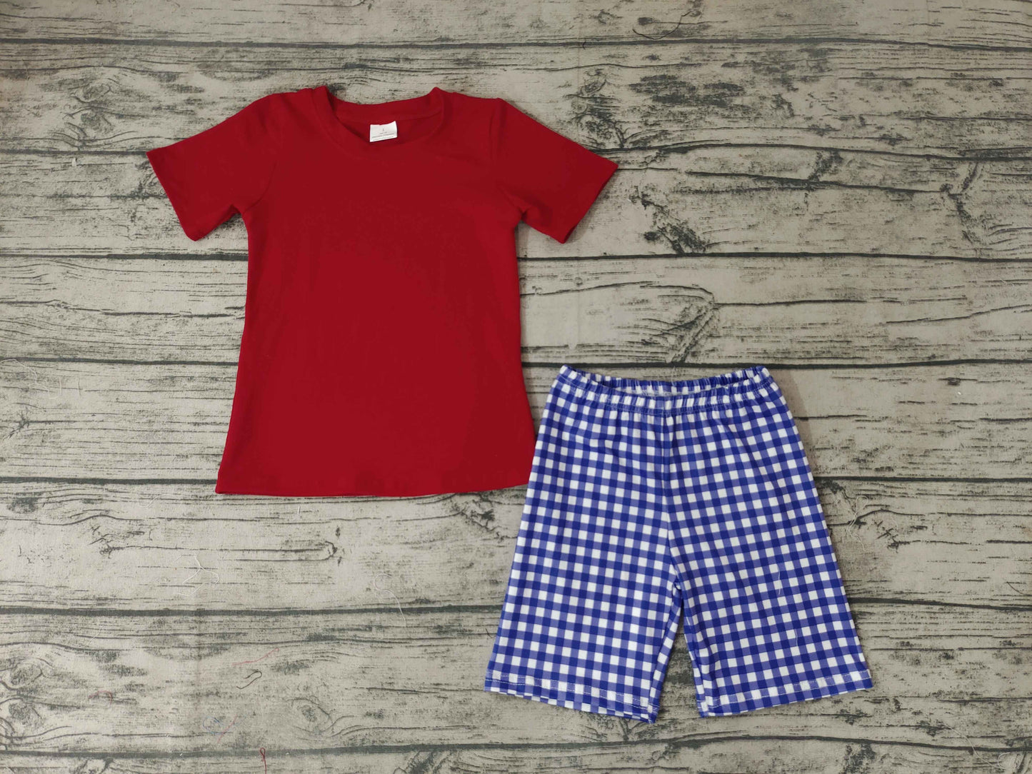 boys red short sleeve top with short pants