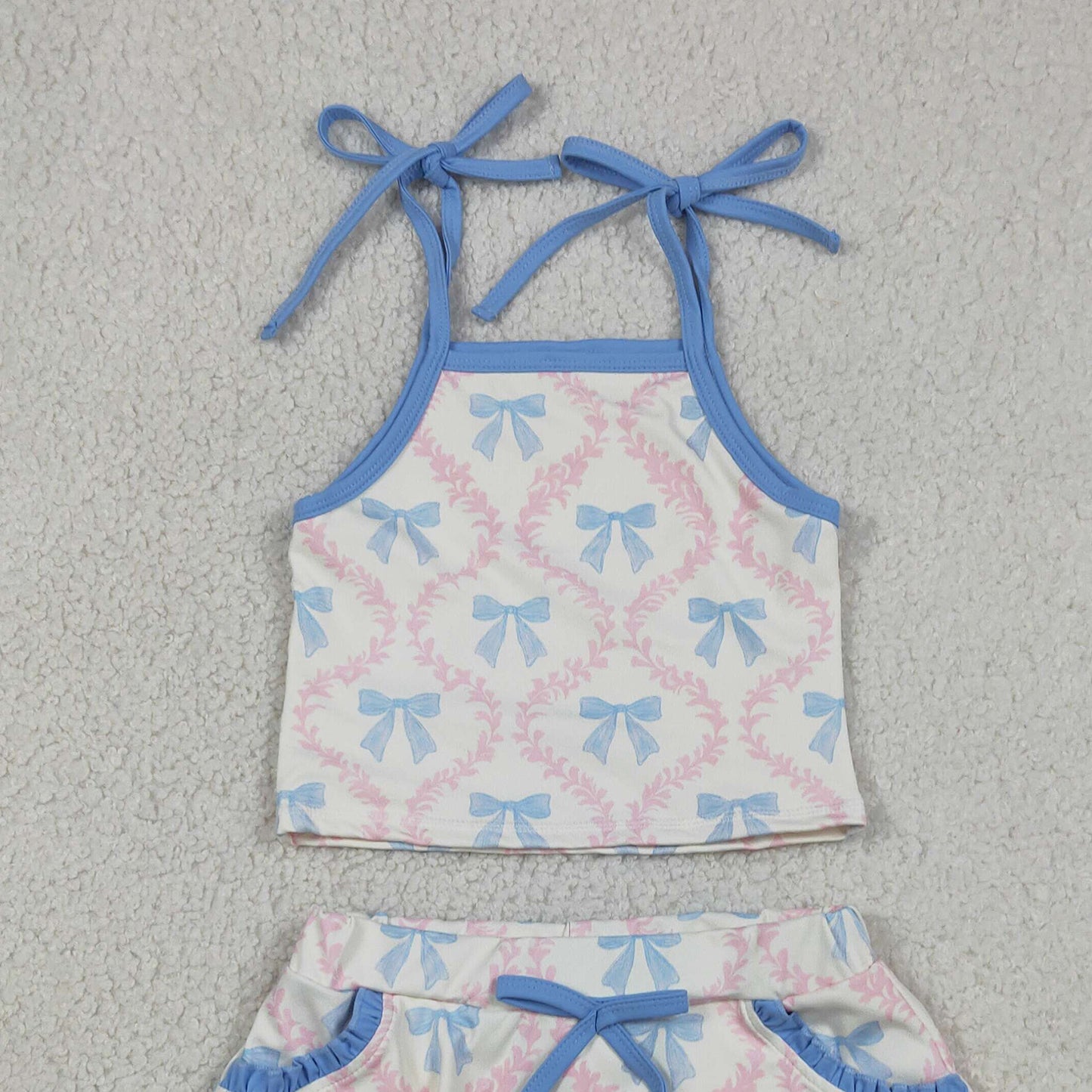 RTS NO MOQ milk silk GSD3727 Baby Girls Strap Bow Floral Top Scallop Pocket Skort Active Set