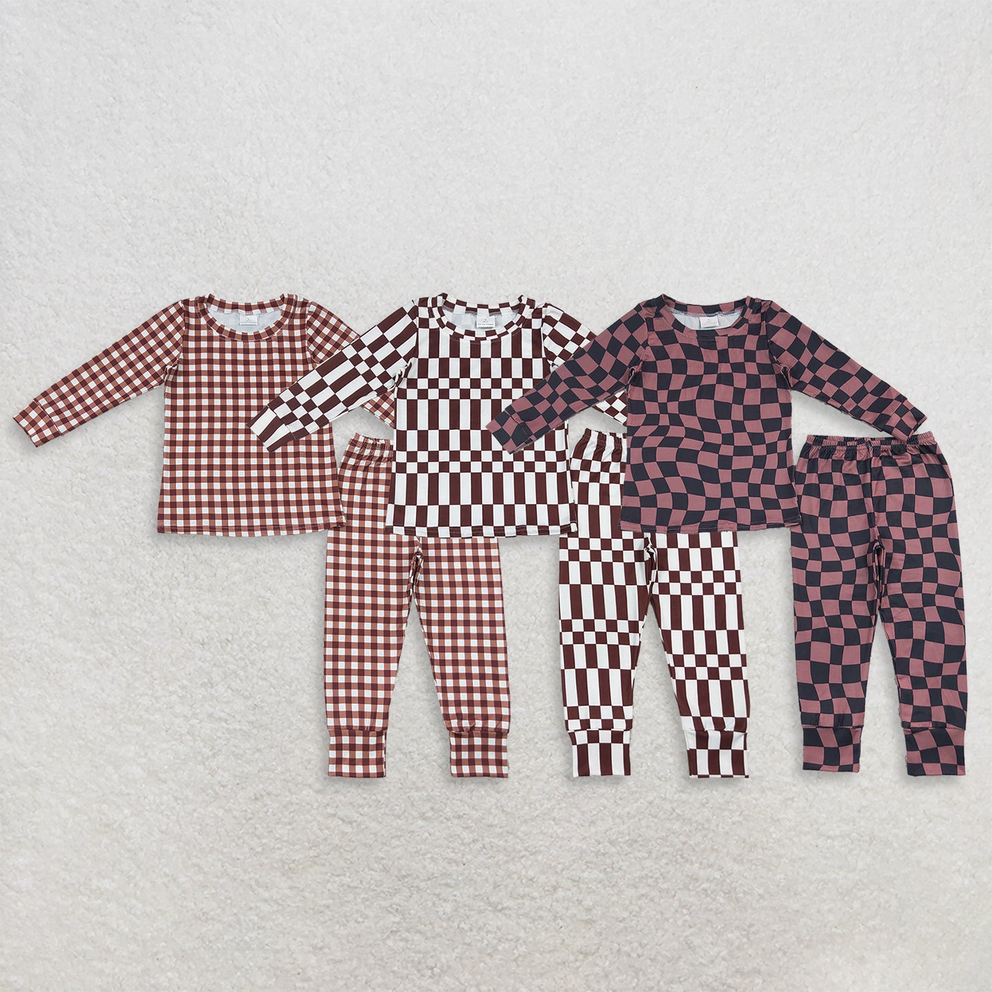 RTS NO MOQ Sibling milk silk Baby Boys Warped Checkerboard Print Top Matching Pants Fall Pajamas Clothes Set