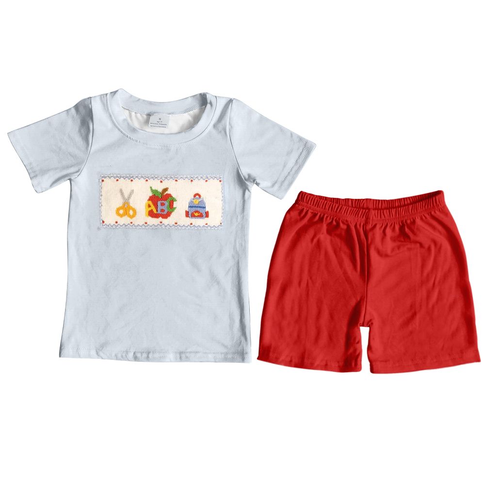 White top and shorts boy's suit