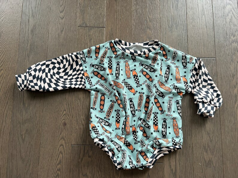 Skateboard Smiley Teal Long Sleeve Bodysuit