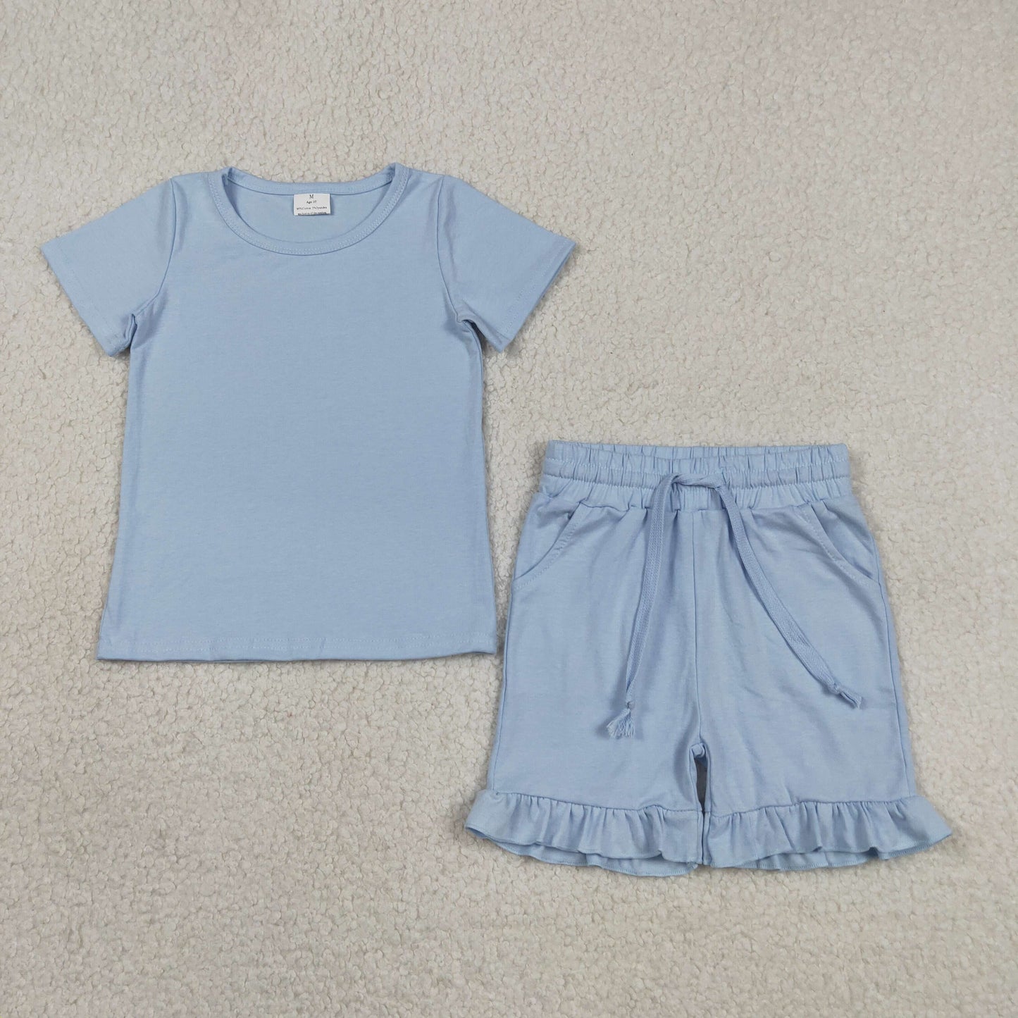 RTS NO MOQ Sibling cotton Baby Girls Short Sleeve Top With Pockets And Ruffle Shorts Set