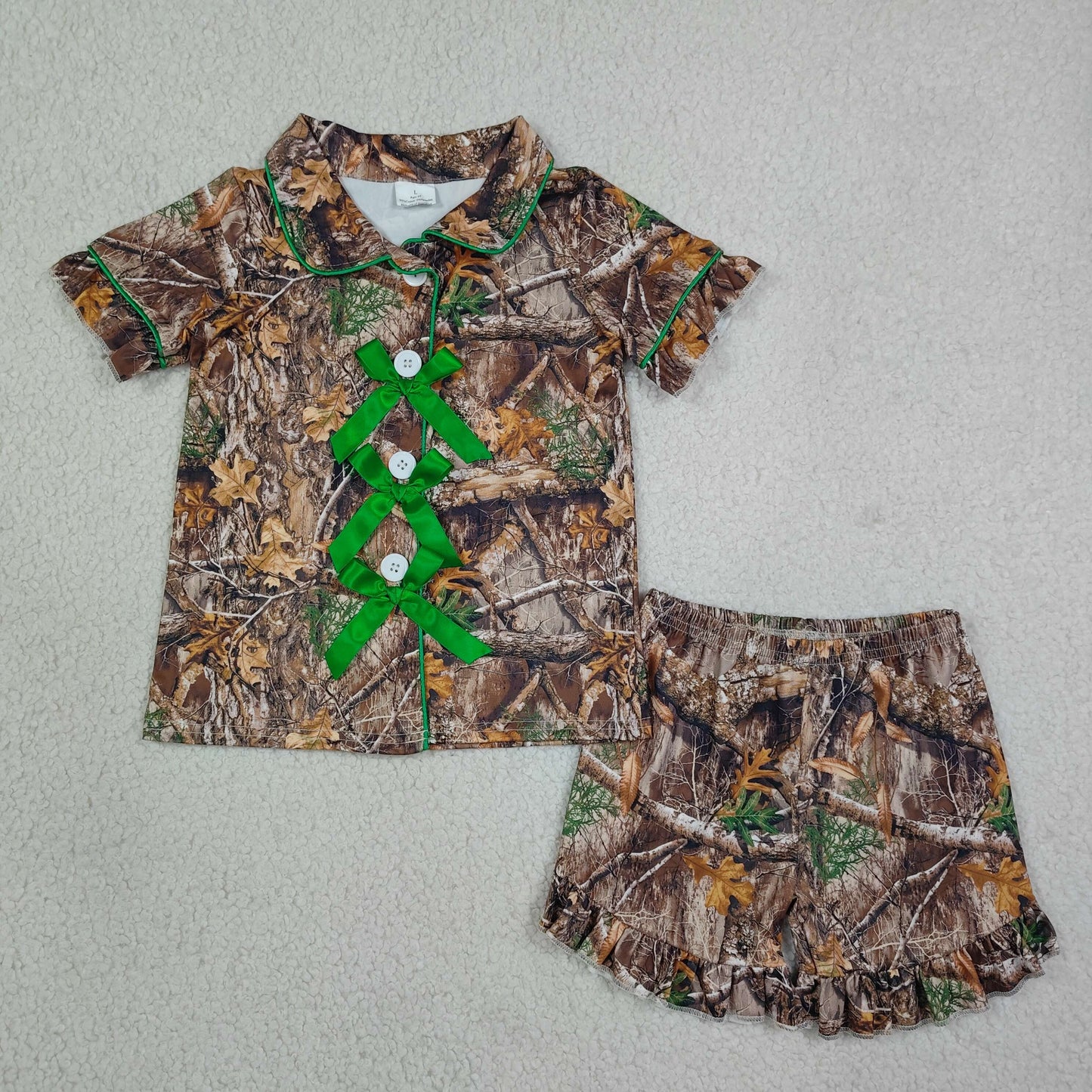 RTS NO MOQ Sibling milk silk Baby Girls Camo Print Bow Button Front Short Sleeve Top Ruffle Hem Shorts Summer Sleep Pajamas Set