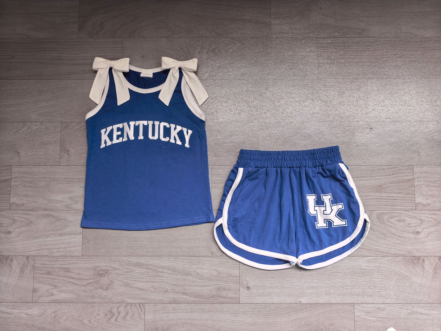 (Sample) No moq milk silk GSSO3830 Vinyl Baby Girls Team Solid White Bow Sleeveless Blue Print Top Elastic Waist Short Bottom Outfit Set