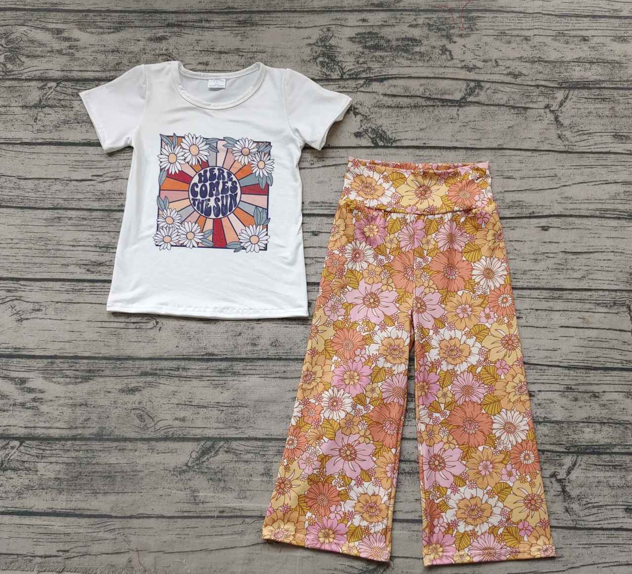 here comes the sun letter flower white short sleeve orange trouser suit