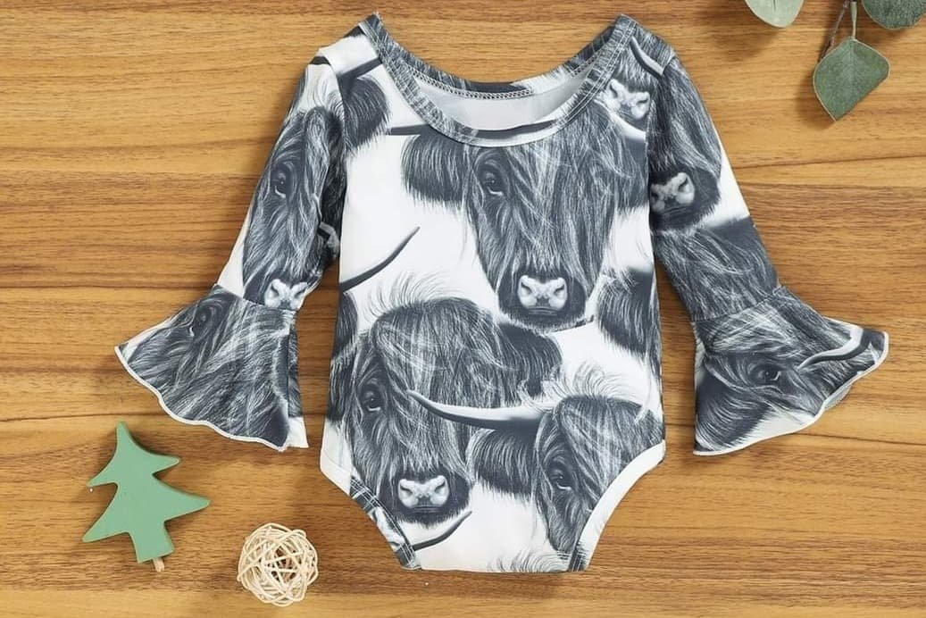 Black and White Alpine Cattle Long Sleeve Bodysuit