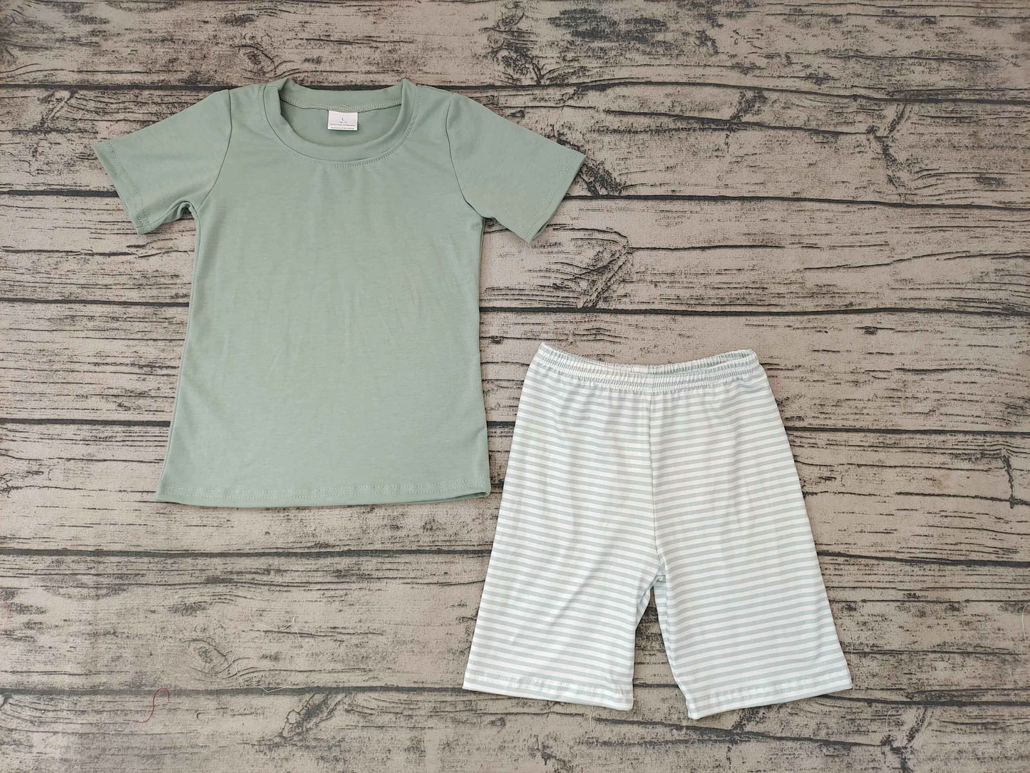 boys short sleeve green top with short pants